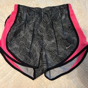 Pink, black and white Nike shorts